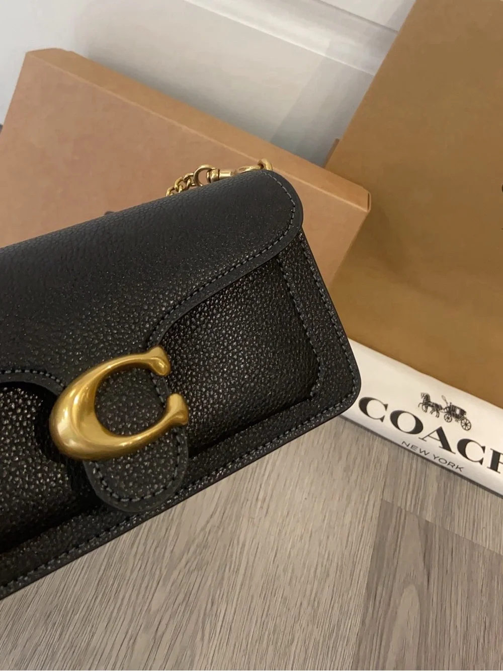 Coach Black Leather Crossbody with Gold 'C' Hardware and Chain Strap